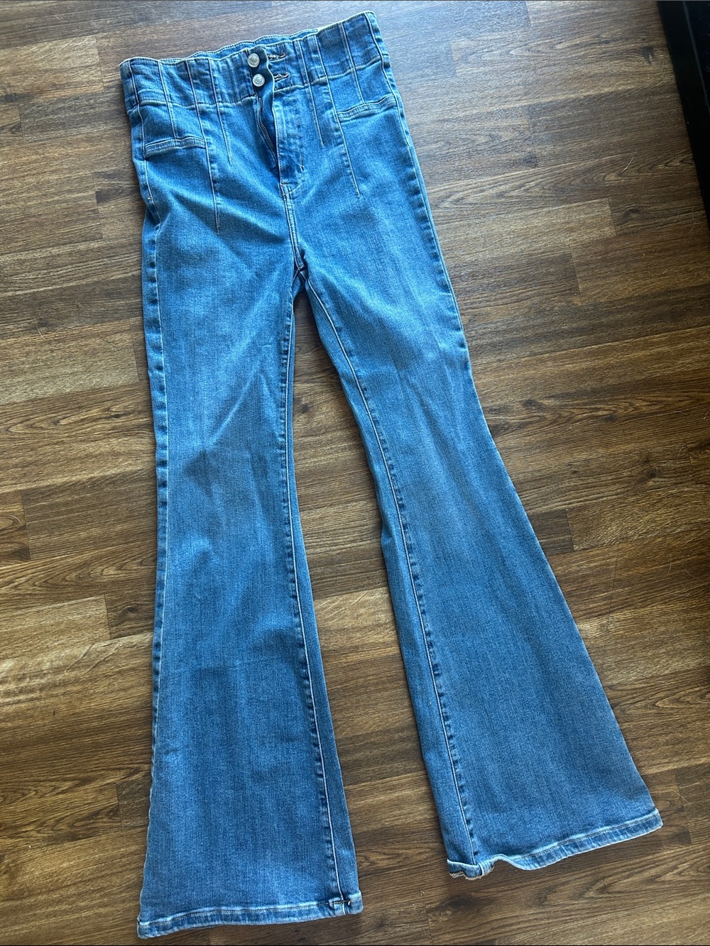 FREE PEOPLE We The Free Medium Blue High-Rise Flare Jeans Color: Sunburst Blue